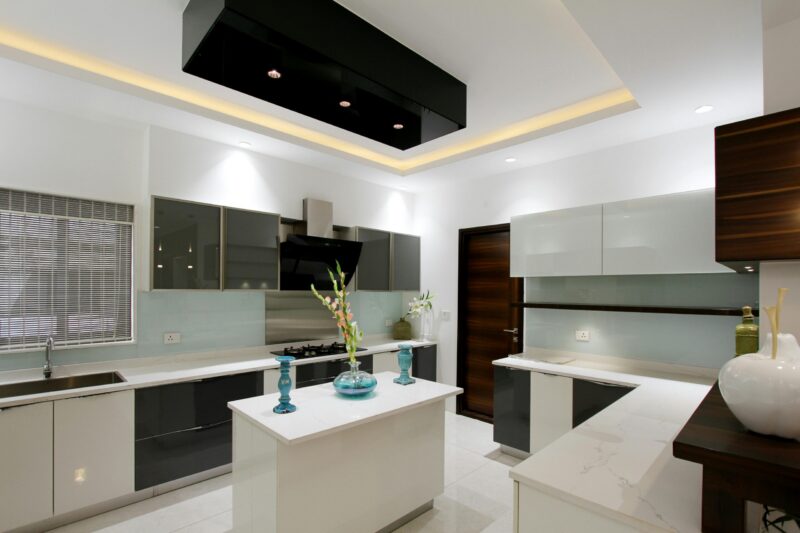 Explore a sleek and modern kitchen interior showcasing minimalist design and elegance in Hyderabad.